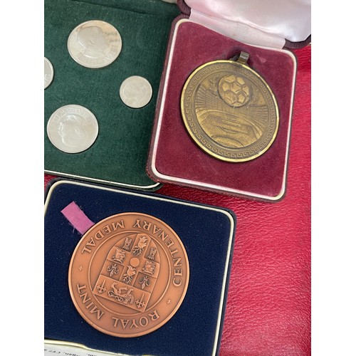 571 - Selection of cased coins and medals