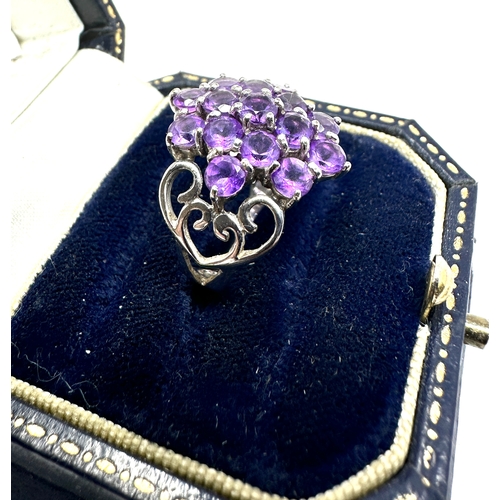 324 - 9ct white gold amethyst ring weight 4.7g