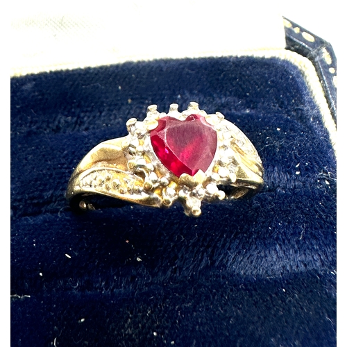 68 - 9ct gold syn ruby & diamond halo ring weight 2.6g