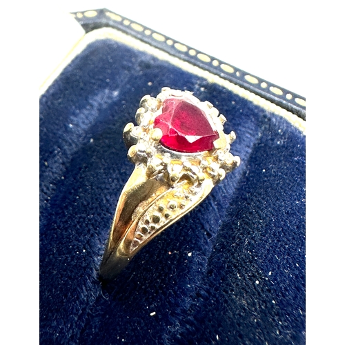 68 - 9ct gold syn ruby & diamond halo ring weight 2.6g