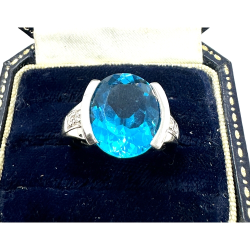 72 - 9ct white gold blue topaz diamond shoulders  ring weight 7.5