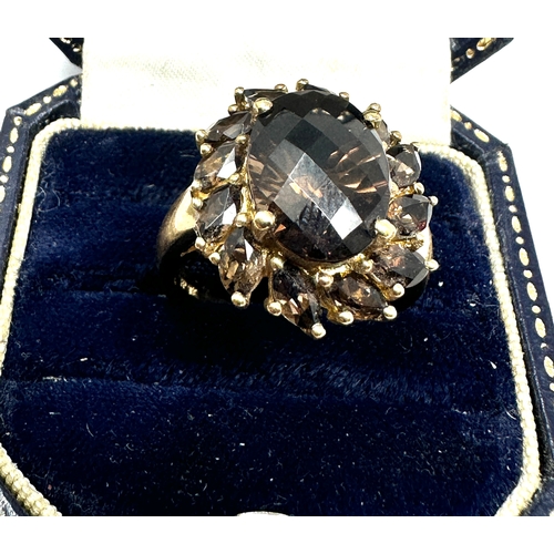 74 - 9ct gold smoky quartz cluster ring weight 6.8g