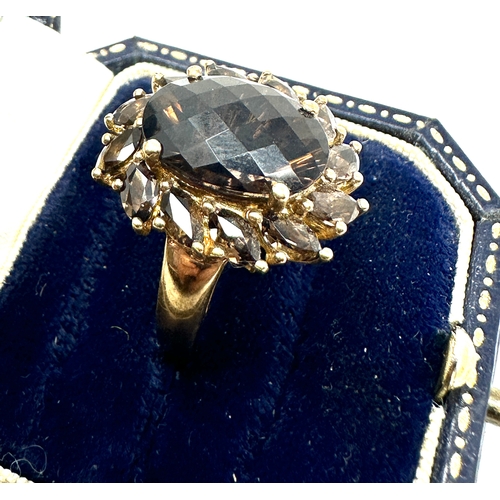 74 - 9ct gold smoky quartz cluster ring weight 6.8g