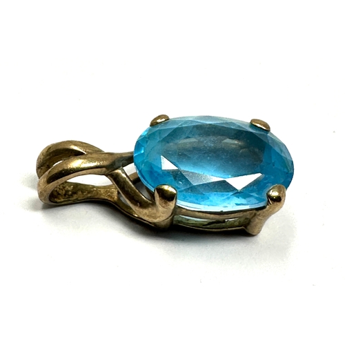 76 - 9ct gold blue topaz pendant weight 3g