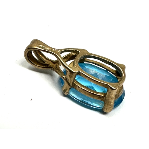 76 - 9ct gold blue topaz pendant weight 3g