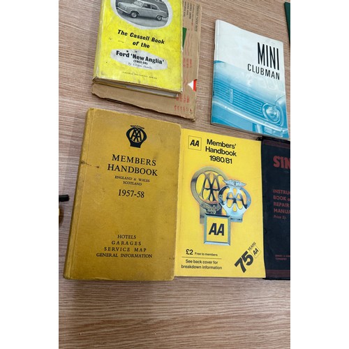 255 - Collection of car manuals + 1957/8 AA badge