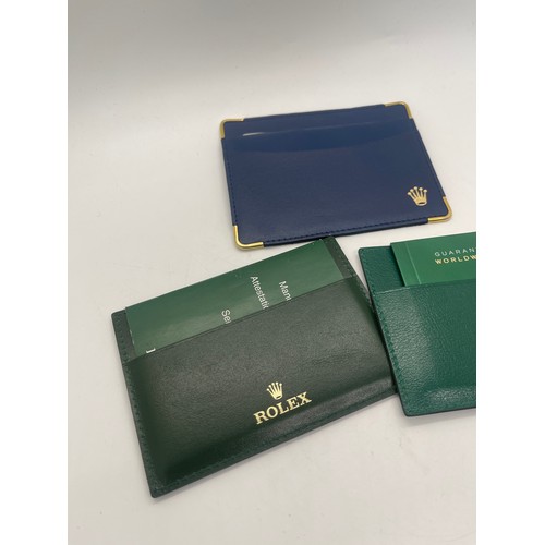 431 - Three original Rolex card holders