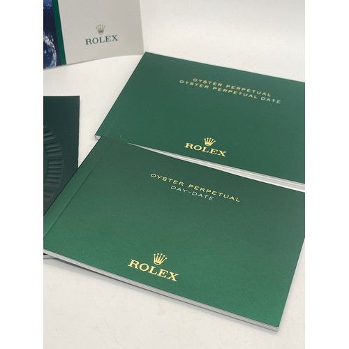 427 - Selection of Rolex watch booklets includes Datejust, Day Date etc