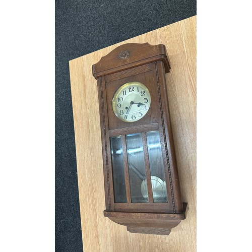 201 - Oak Edwardian wall clock overall length 32 inches