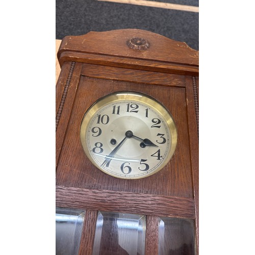 201 - Oak Edwardian wall clock overall length 32 inches