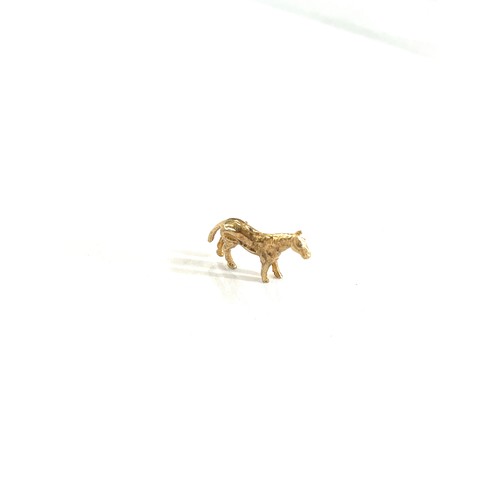 468 - 9ct gold horse charm , total weight 2.6g