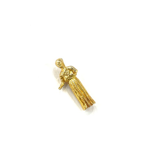 477 - Unmarked tested 18k gold lady charm, approxiamte weight 4.1g