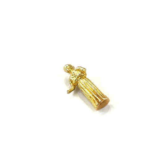 477 - Unmarked tested 18k gold lady charm, approxiamte weight 4.1g