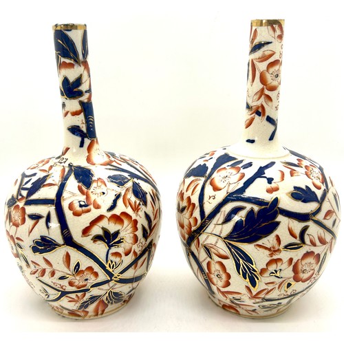 612 - 2 Antique hand painted bottle vases, each measures approximately 21cm tall