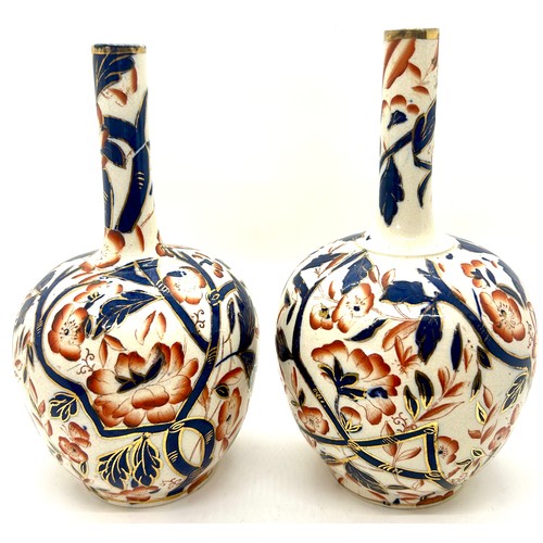 612 - 2 Antique hand painted bottle vases, each measures approximately 21cm tall