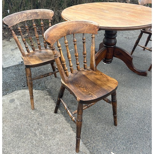 326 - Dark stained Pine round pedestool table and 4 elm chairs. Table diameter 44 inches, table height 29 ... 