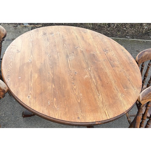 326 - Dark stained Pine round pedestool table and 4 elm chairs. Table diameter 44 inches, table height 29 ... 