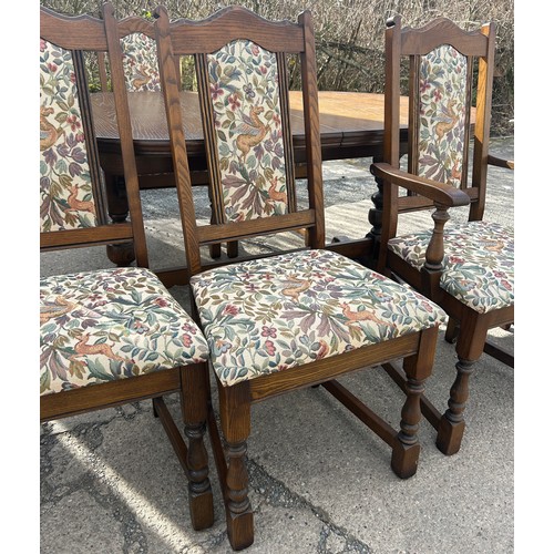 333 - Old charm extending table, 1 leaf and  6 chairs to include to 2 carvers, table measurements: length ... 