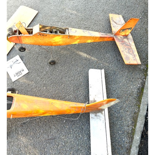 369 - Selection of 2 project model planes, both in need of repair, one has and engine, kadet