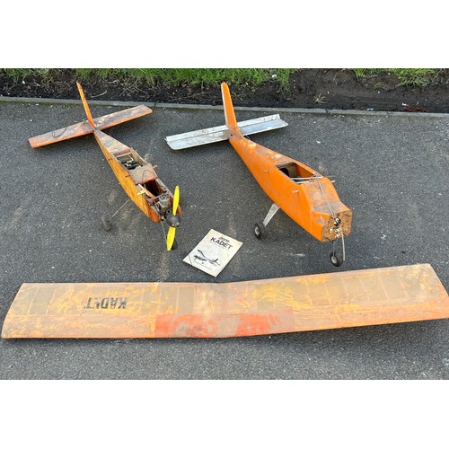 369 - Selection of 2 project model planes, both in need of repair, one has and engine, kadet