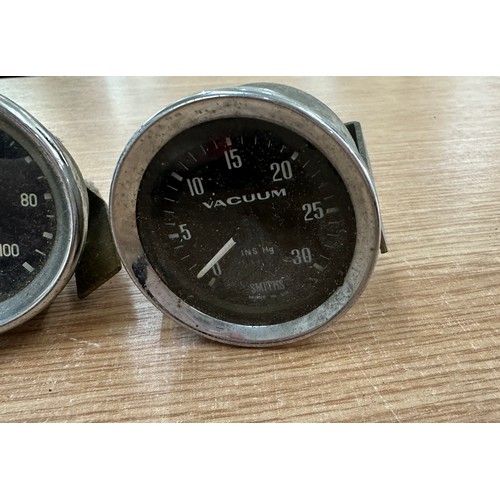 569 - Three vintage Pressure gauges includes Smiths Vacuum, AMPS etc