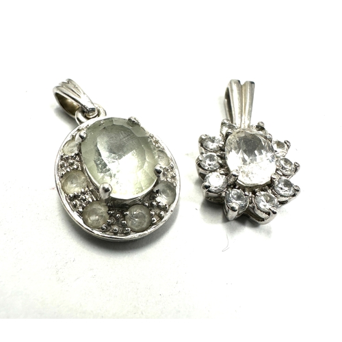 111 - 2 9ct white gold white gemstone pendants weight 4.3 g