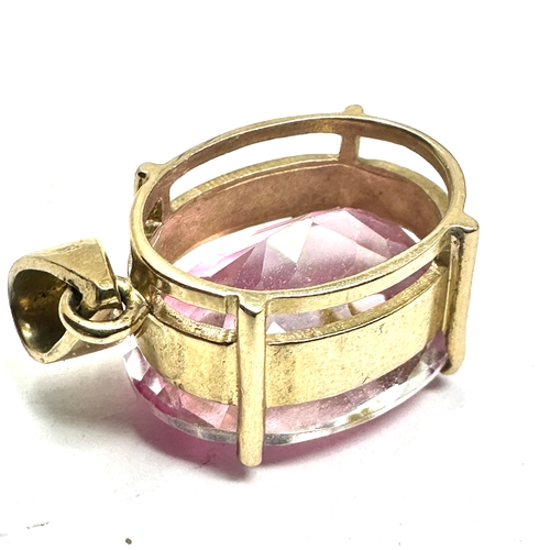 114 - 9ct gold syn pink sapphire  pendant weight 8.8g