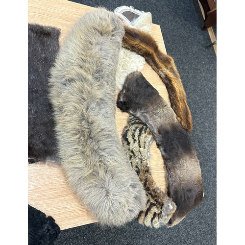 215 - Selection of vintage pelts including mink, wild cat, astrakhan etc