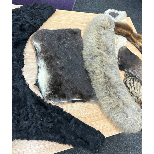 215 - Selection of vintage pelts including mink, wild cat, astrakhan etc