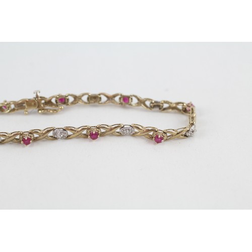 152 - 9ct gold diamond and ruby set Hugs and Kisses bracelet (4.1g)