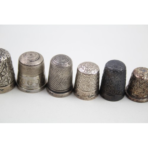 383 - 9 x .925 sterling thimbles inc victorian etc