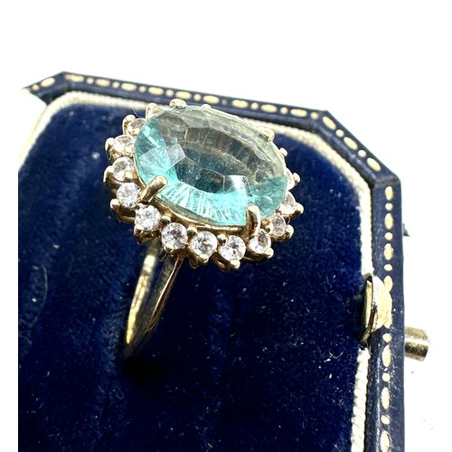 325 - 9ct gold blue and white gemstone ring weight 4.8g