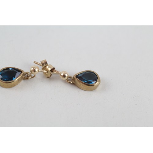 155 - 9ct gold deep blue topaz set teardrop earrings (1.5g)