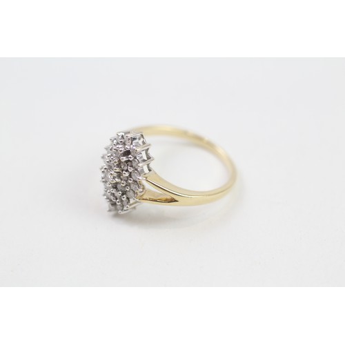 186 - 18ct gold diamond dress ring (4.3g)