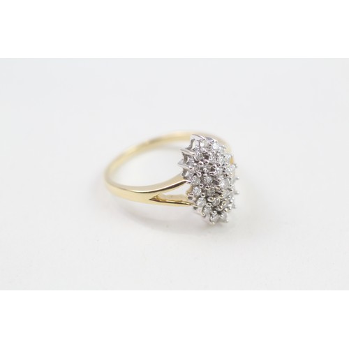 186 - 18ct gold diamond dress ring (4.3g)