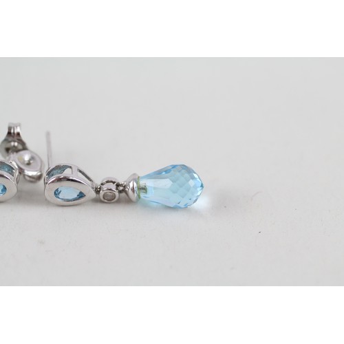 191 - 9ct white gold blue topaz and diamond set drops (2.9g)