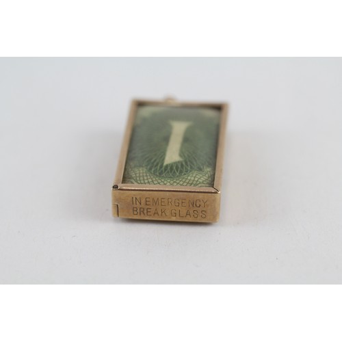 211 - 9ct gold vintage in cased bank note charm (3g)