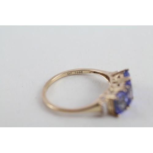 219 - 9ct gold tanzanite & diamond three stone ring (2.3g) ring size Q