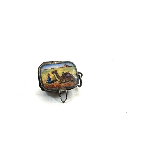 530 - Egyptian silver and enamel basket charm with baby