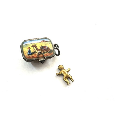 530 - Egyptian silver and enamel basket charm with baby