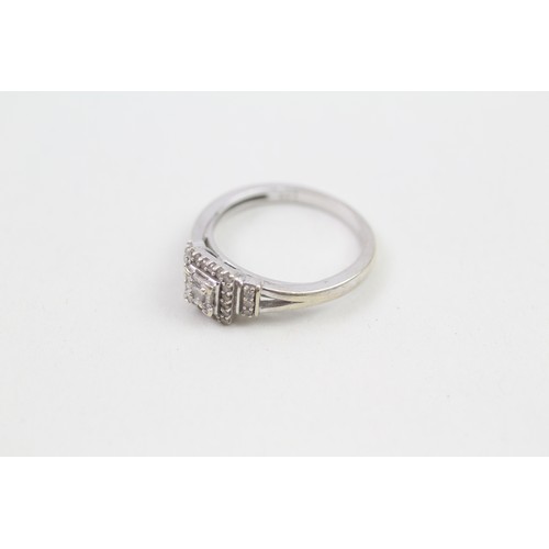 236 - 9ct white gold diamond halo ring (2.7g) ring size L