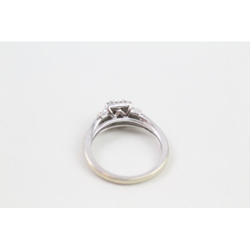 236 - 9ct white gold diamond halo ring (2.7g) ring size L