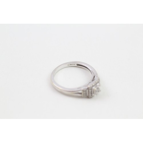 236 - 9ct white gold diamond halo ring (2.7g) ring size L