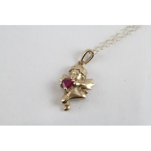 240 - 9ct gold ruby cherub pendant & chain (2.1g)