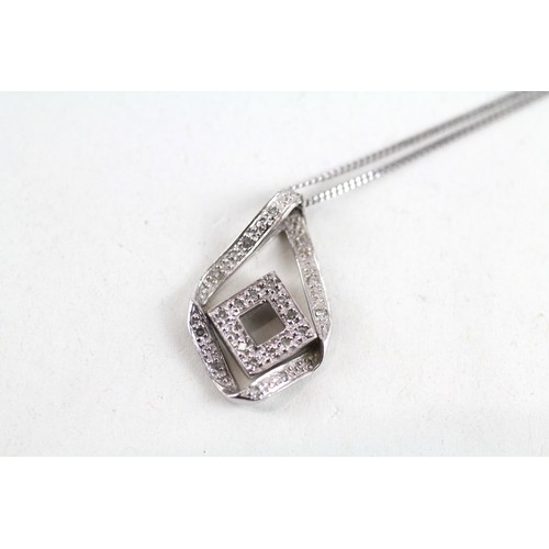 248 - 9ct gold diamond pendant & cahin (2g)