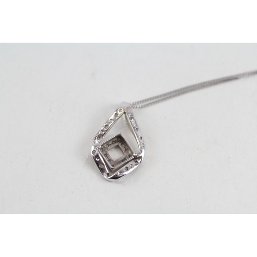 248 - 9ct gold diamond pendant & cahin (2g)