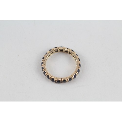 254 - 9ct gold sapphire full eternity ring (2.2g) ring size h/i