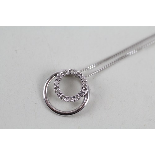 258 - 9ct white gold diamond halo pendant necklace (2.2g)