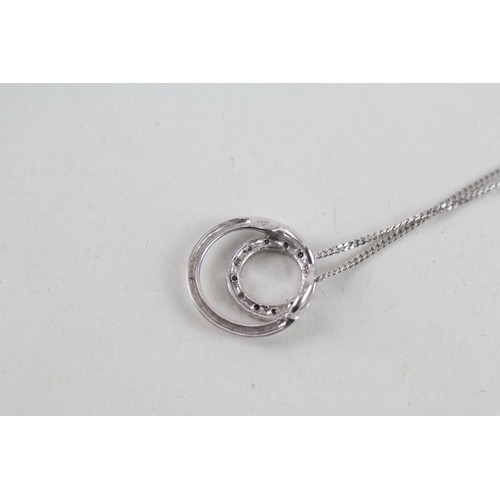 258 - 9ct white gold diamond halo pendant necklace (2.2g)