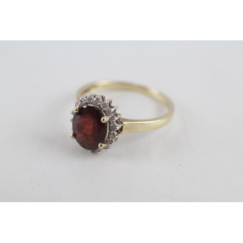 262 - 9ct gold garnet & diamond cluster ring (3.5g) ring size t/u